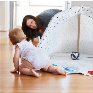 Lovevery play gym with tent and accessories.